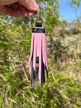 Load image into Gallery viewer, Clip Tassel- Black, Light Pink and Oil Splatter Cowhide Leather with Beaded Charm
